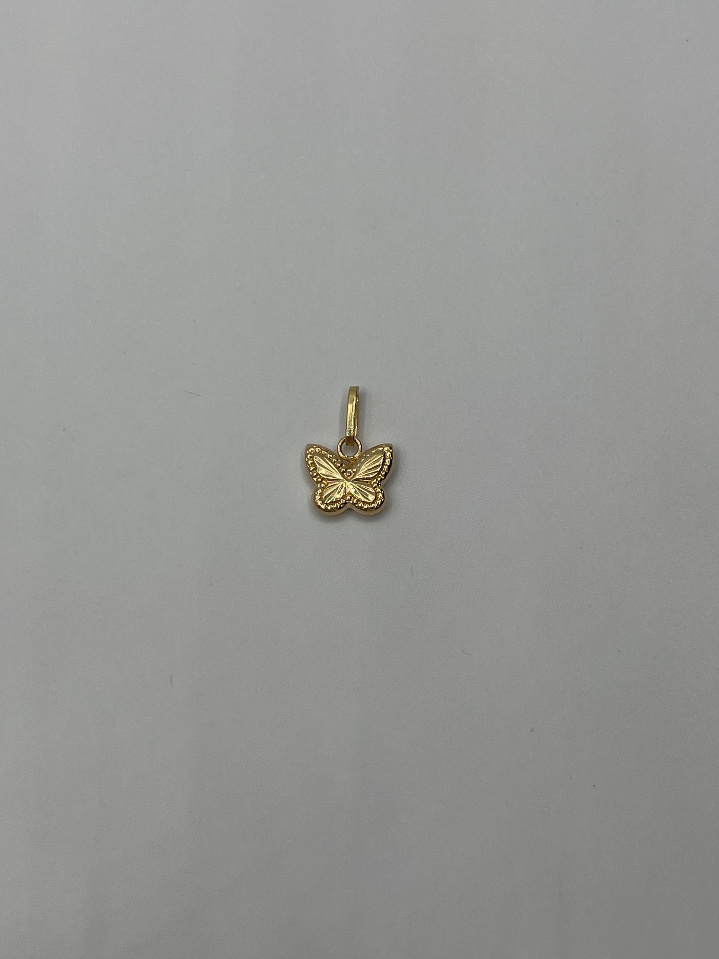 Dije Mariposa Diamantada Oro amarillo 18k 0,46 Gr / 10 mm / 0,9 Cm
