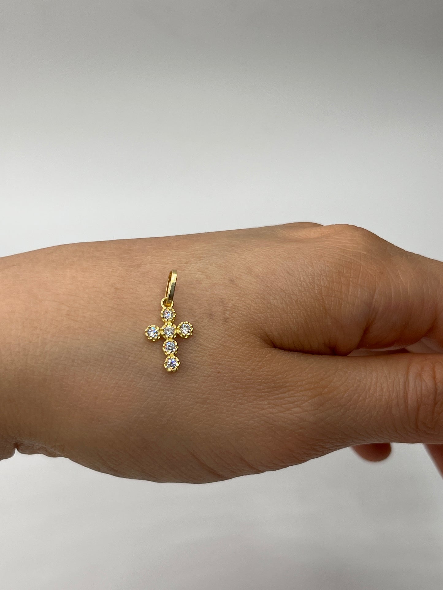 Dije cruz circon blanco Oro amarillo 18k 0,70 Gr / 8,75 mm / 1,4 Cm