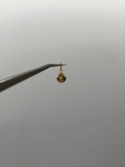 Dije RX Oro amarillo 18k 0,25 Gr / 7 mm / 0,9 Cm