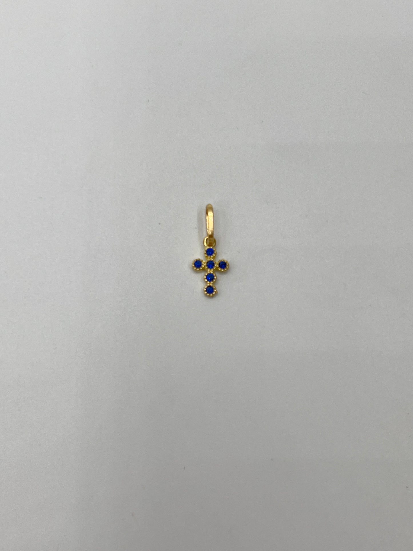 Dije cruz circon azul Oro amarillo 18k 0,33 Gr / 5,60 mm / 0,90 Cm
