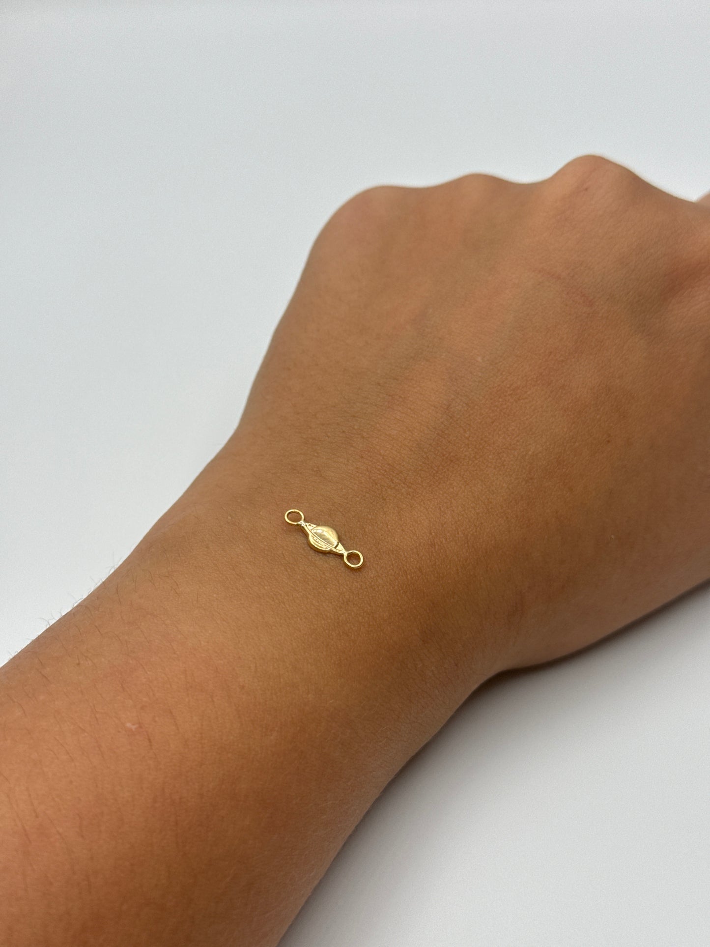 Herraje planeta Saturno Oro amarillo 18k 0,17 Gr / 1,4 Cm