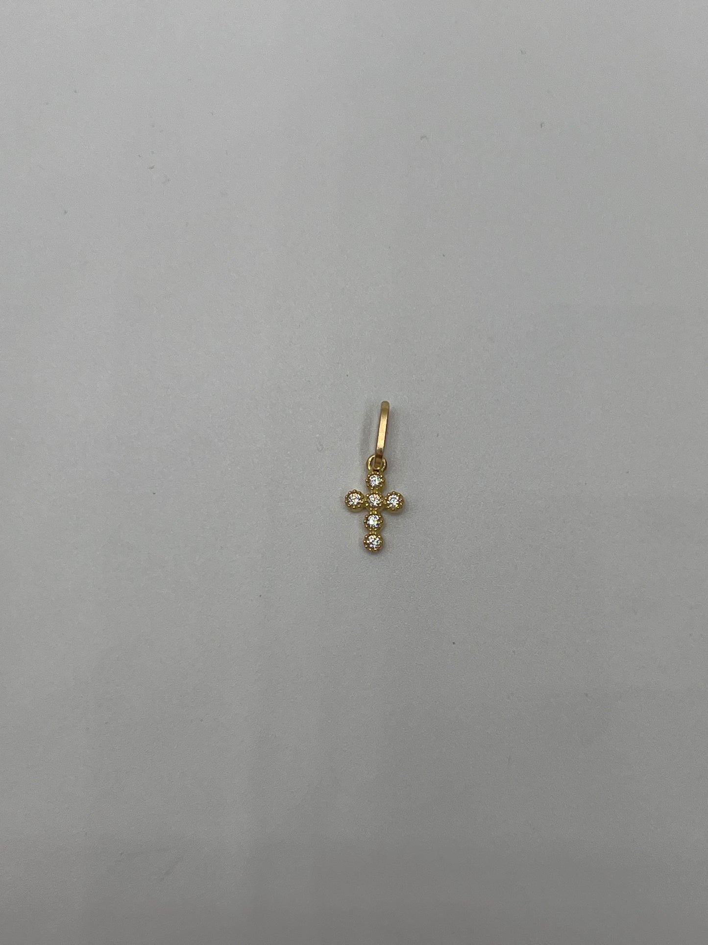 Dije cruz circon blanco Oro amarillo 18k 0,33 Gr / 5,60 mm / 0,9 Cm