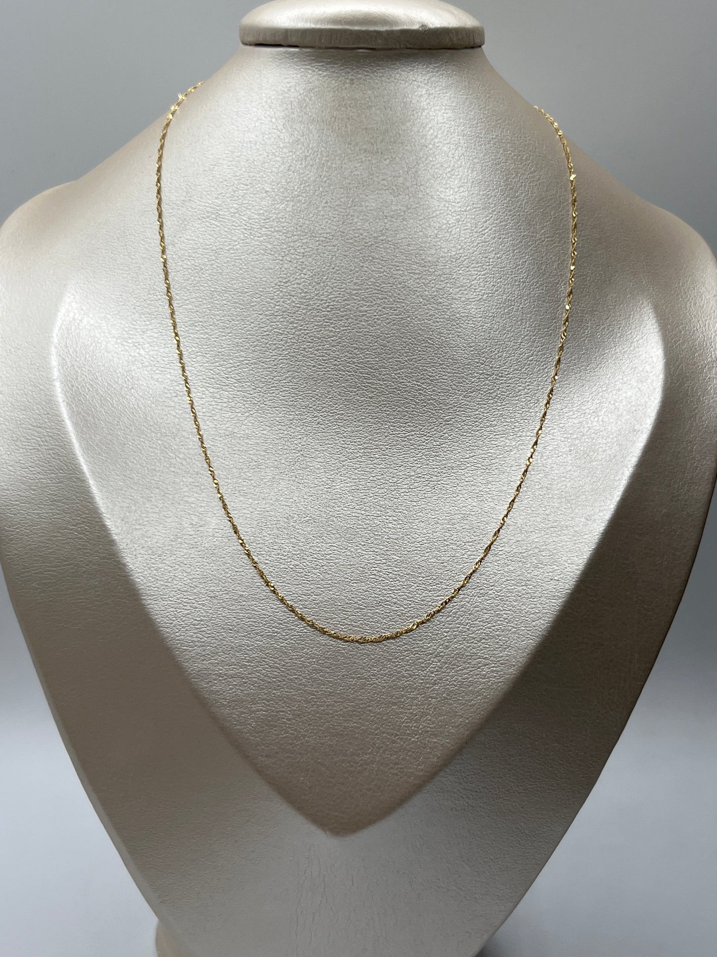 Cadena It Singapur Oro amarillo 18k +3 / 1,04 Gr / 0,60 mm / 45 Cm