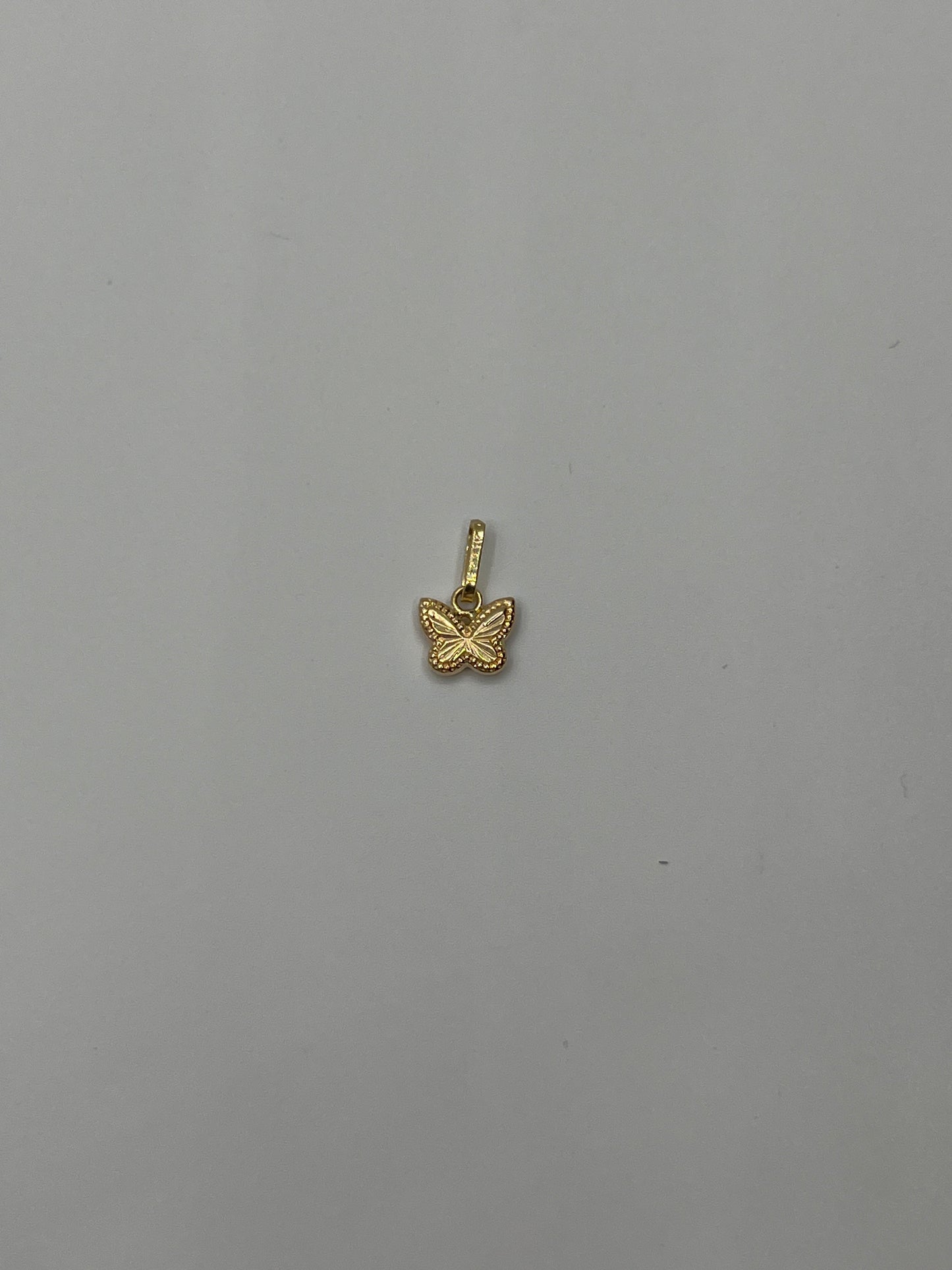 Dije Mariposa Diamantada Oro amarillo 18k 0,34 Gr / 8,20 mm / 0,8 Cm