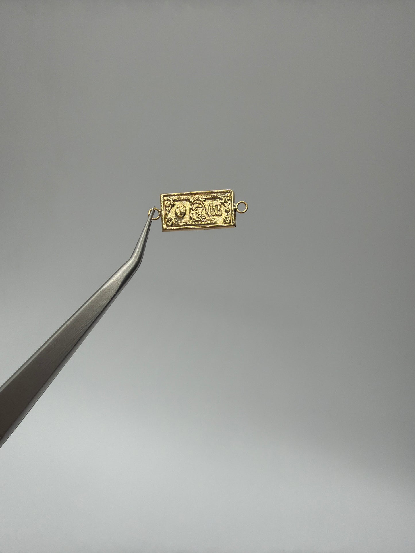 Herraje Dolar Oro amarillo 18k 0,73 Gr / 0,8 Cm