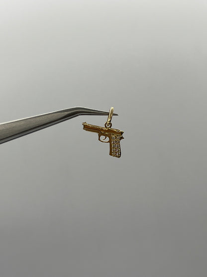 Dije pistola circon blanco Oro amarillo 18k 1,06 Gr / 12,70 mm / 1 Cm