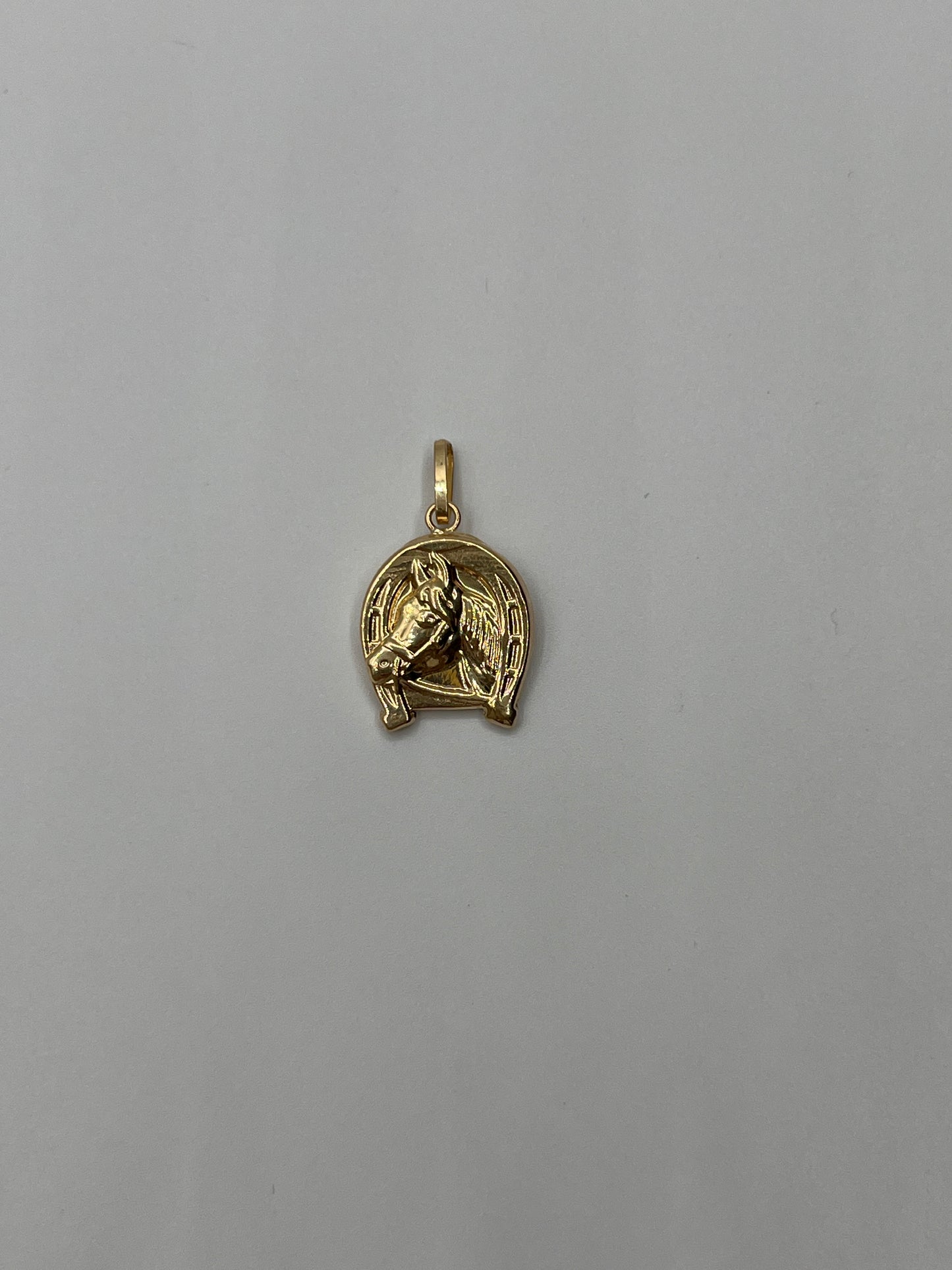 Dije Caballo Oro amarillo 18k 1 Gr / 13,40 mm / 1,3 Cm