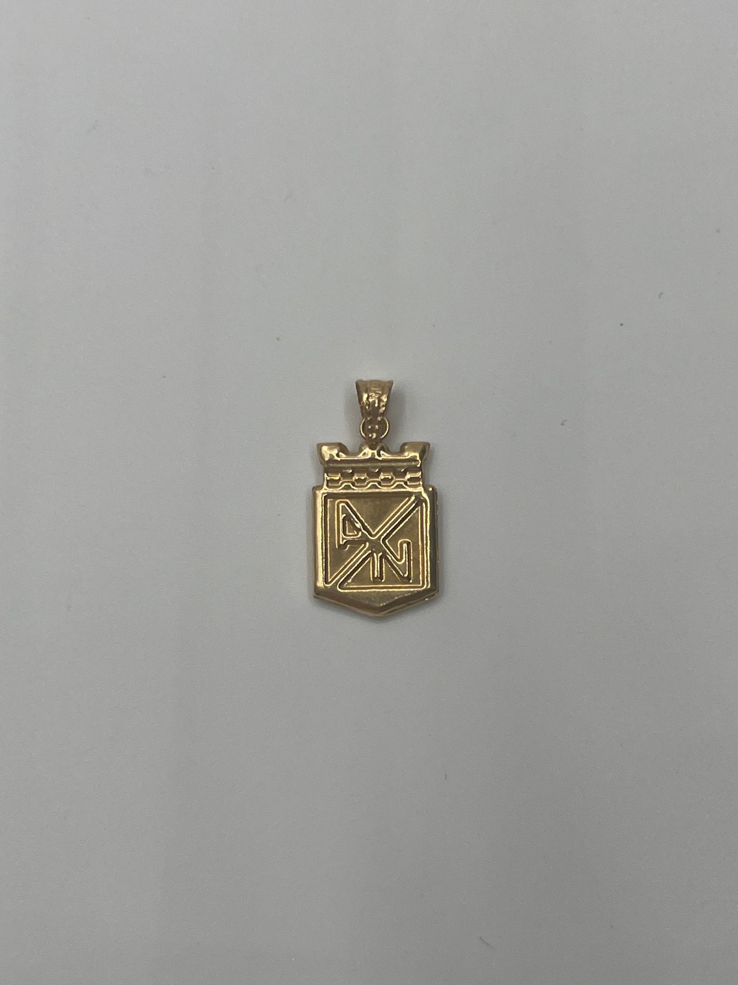 Dije Atletico Nacional Oro amarillo 18k 0,65 Gr / 10,9 mm / 1,5 Cm
