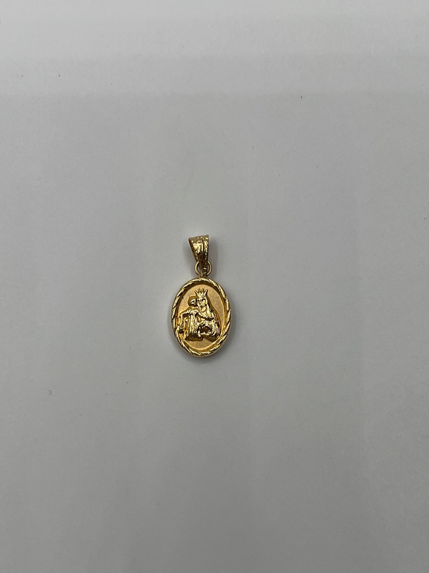 Dije Maria Auxiliadora Oro amarillo 18k 0,62 Gr / 9,3 mm / 1,2 Cm