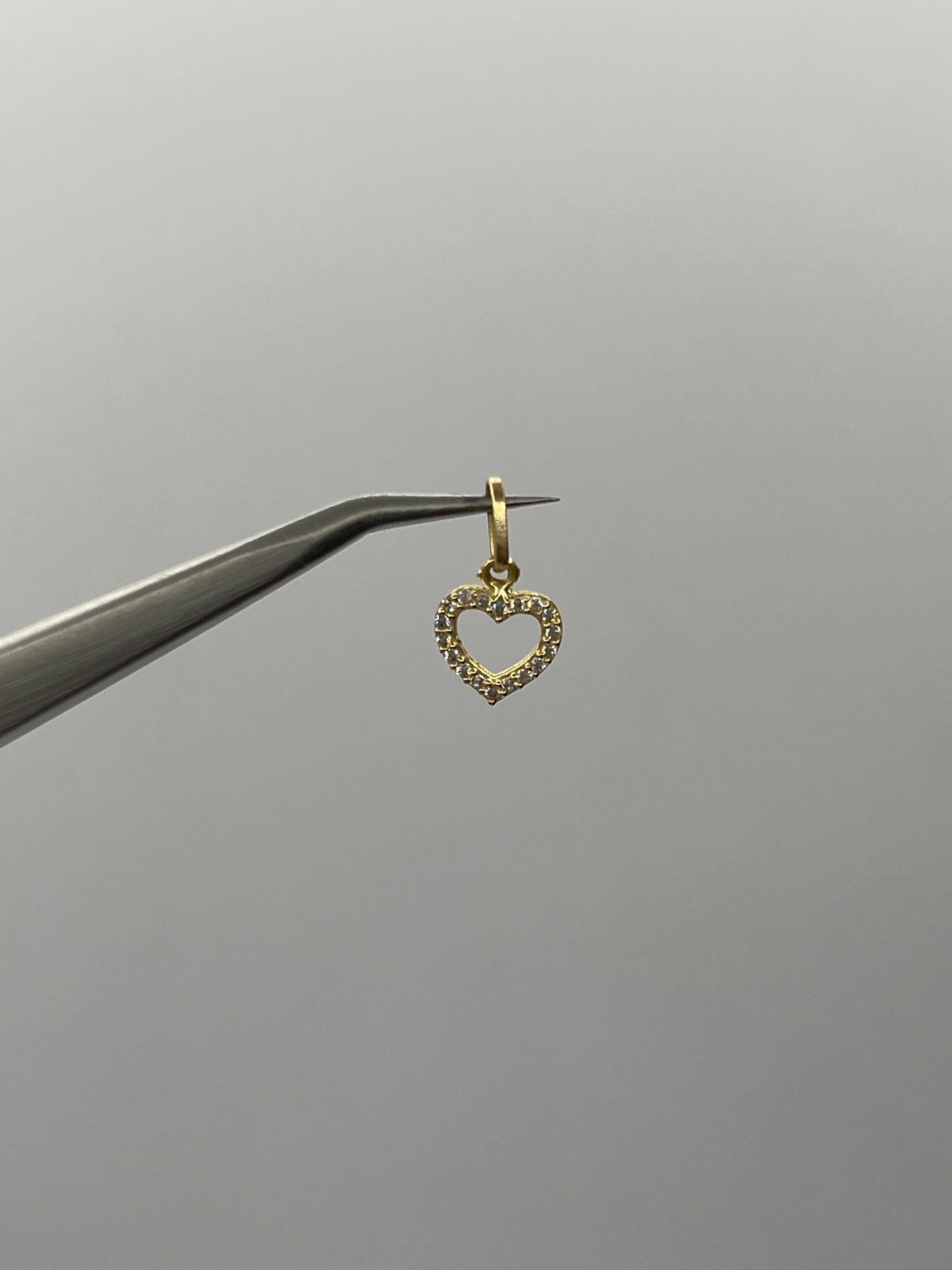Dije corazon circon blanco Oro amarillo 18k 0,46 Gr / 8,35 mm / 1 Cm