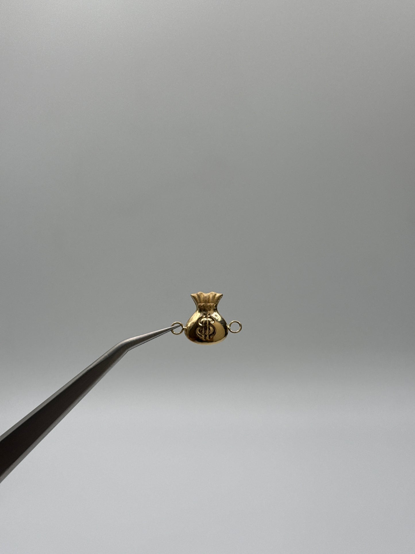 Herraje Bolsa dinero Oro amarillo 18k 0,62 Gr / 1,2 Cm