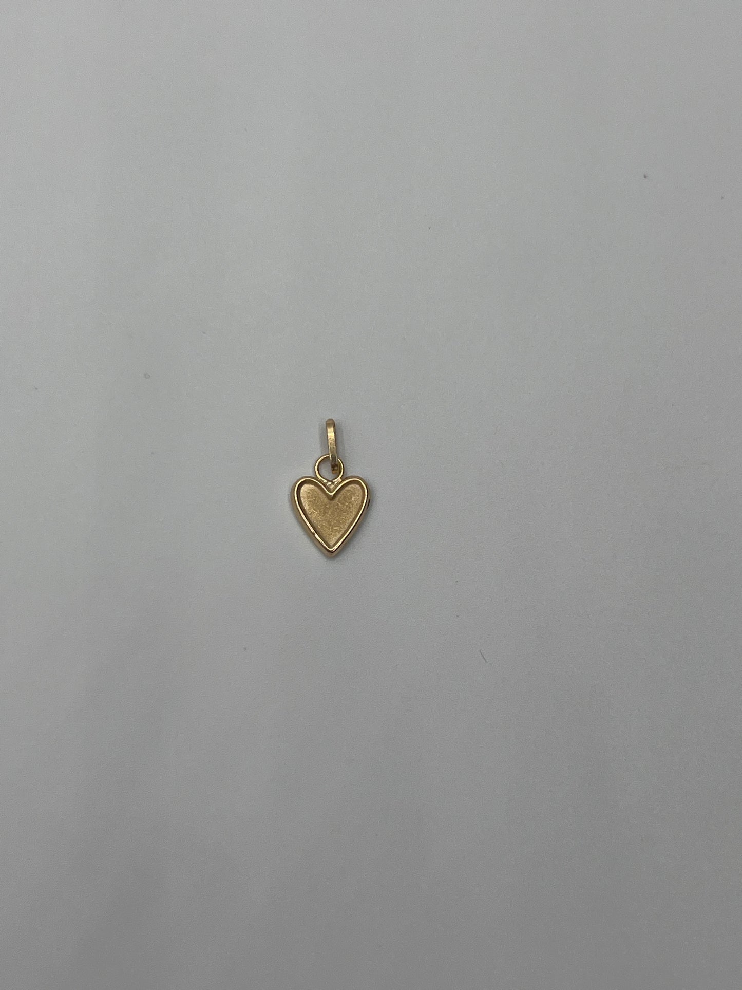 Dije corazón Oro amarillo 18k 0,34 Gr / 7 mm / 1 Cm