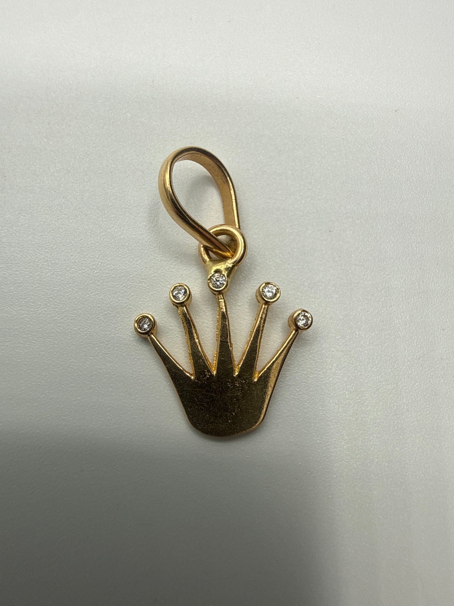 Dije RX Oro amarillo 18k 0,73 Gr / 11,50 mm / 1,4 Cm