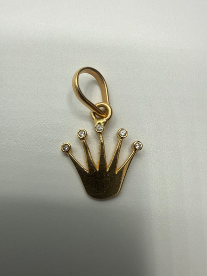 Dije RX Oro amarillo 18k 0,73 Gr / 11,50 mm / 1,4 Cm