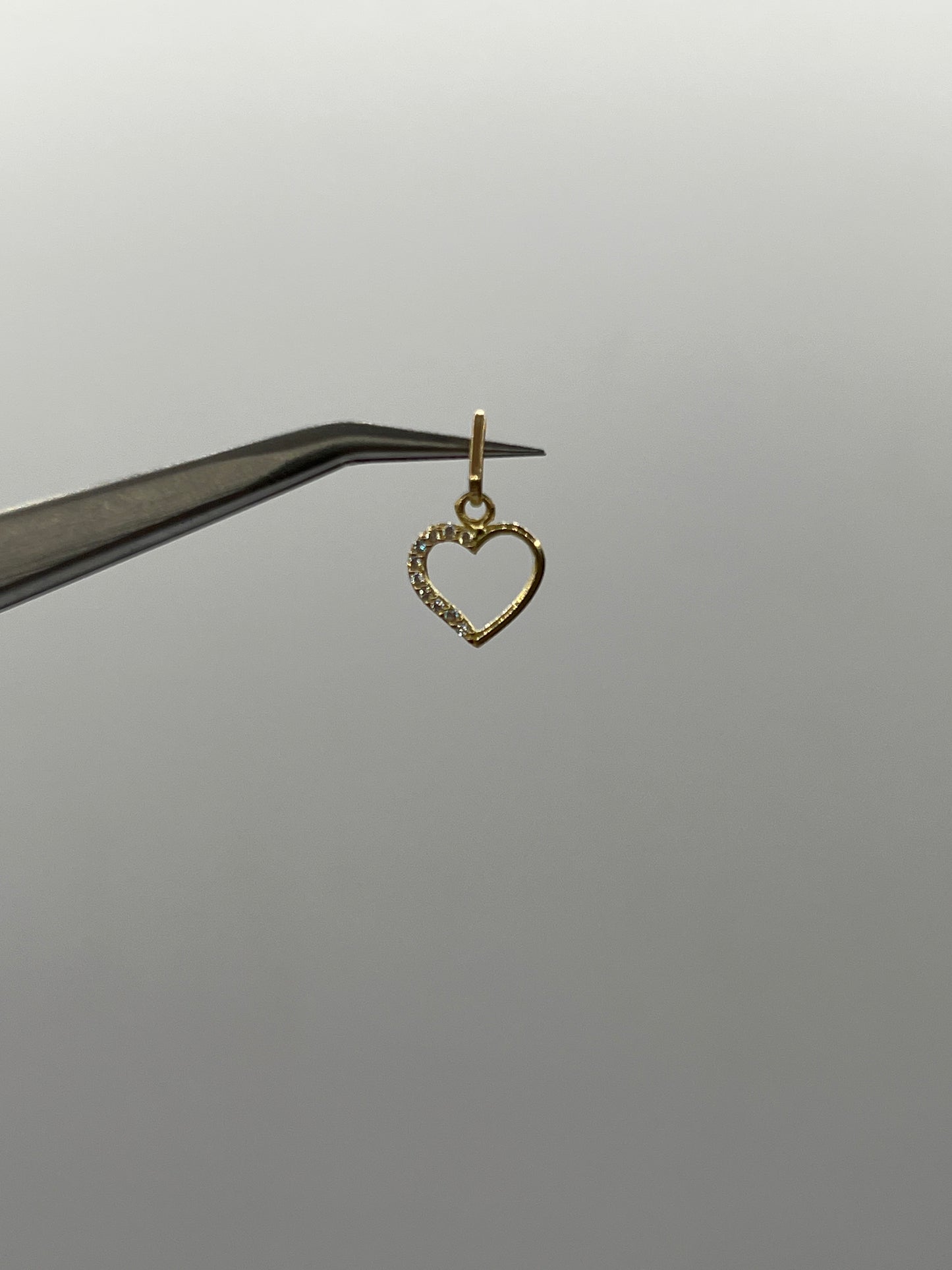 Dije corazon circon blanco Oro amarillo 18k 0,36 Gr / 8,90 mm / 1 Cm
