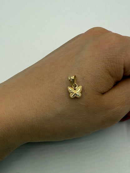 Dije Mariposa Oro amarillo 18k 0,40 Gr / 7,60 mm / 0,9 Cm